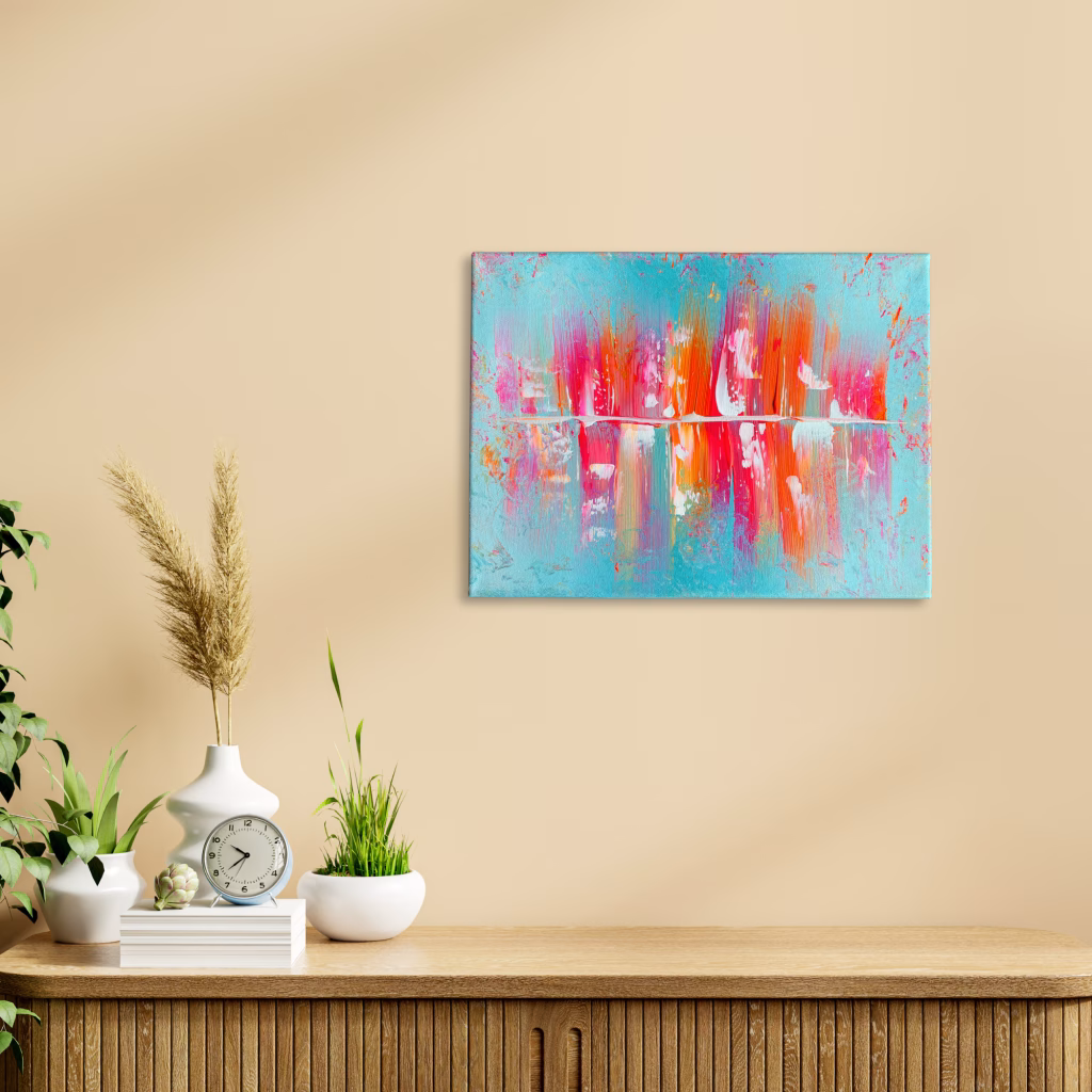 Handgemaltes Acrylgemälde der modernen Künstlerin Janiscolorart in Türkis, Pink und Orange als Wandgestaltung über einem Sideboard. 